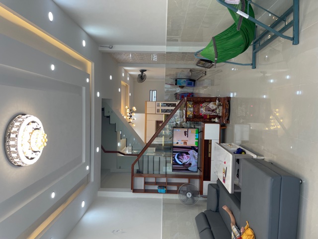 Phòng khách hiện đại, tinh tế nhà Thạnh Xuân, Quận 12 - Xây Dựng Kim Anh