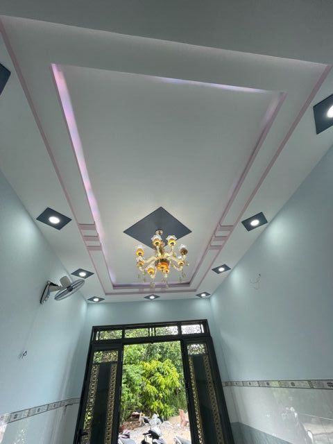 Khu vực phòng khách ấm cúng, tiện nghi nhà phố Quận 12